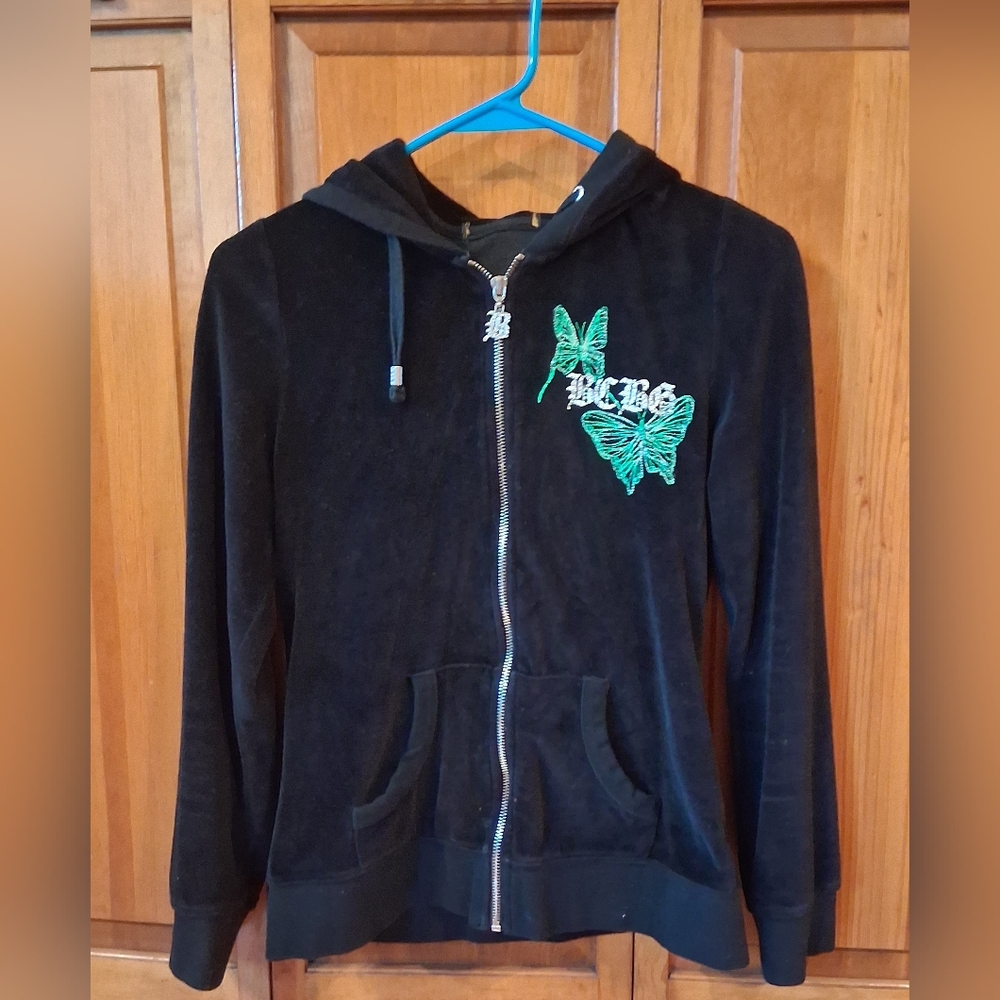 BCBGMAXAZRIA BLACK WITH GREEN BUTTERFLIES AND LOGO. FULL ZIP UP. WOMENS SMALL.